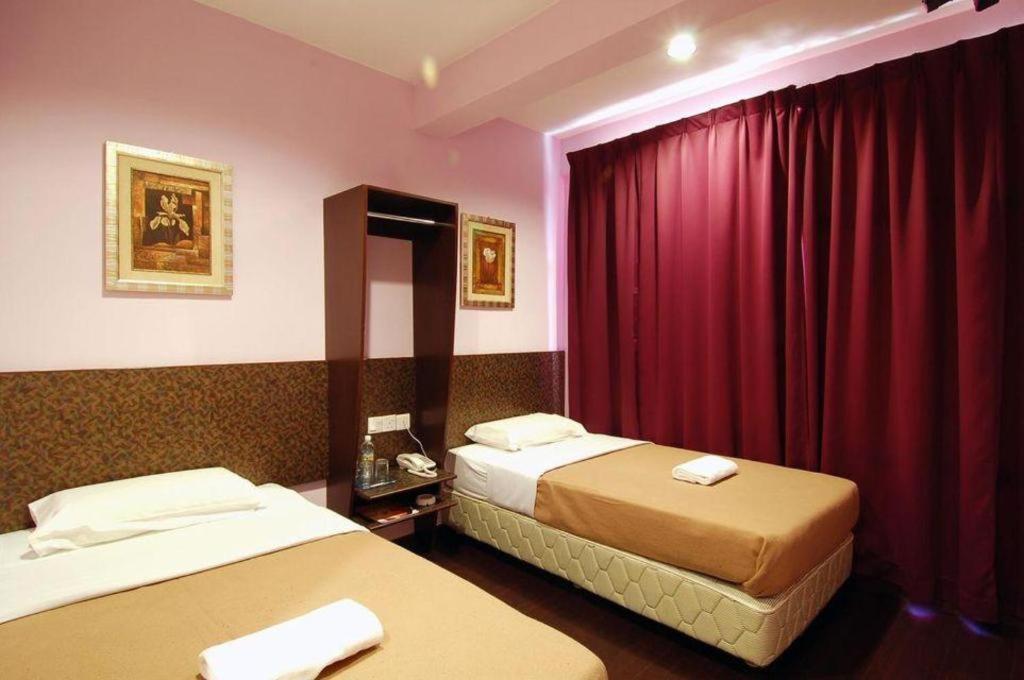 Aristo Hotel @ Putatan Кота Кинабалу Екстериор снимка
