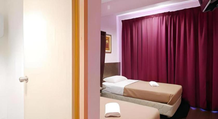 Aristo Hotel @ Putatan Кота Кинабалу Екстериор снимка